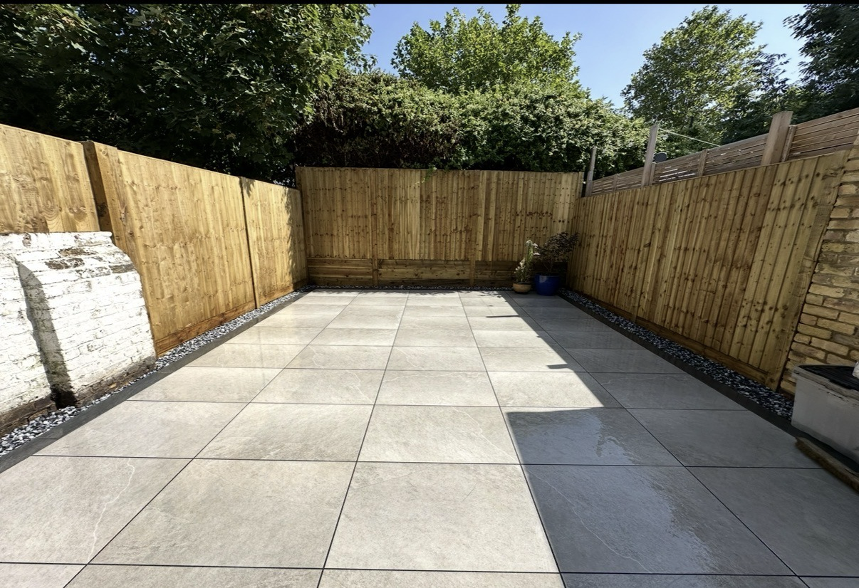 Completed fencing and paving by Applewood Construction